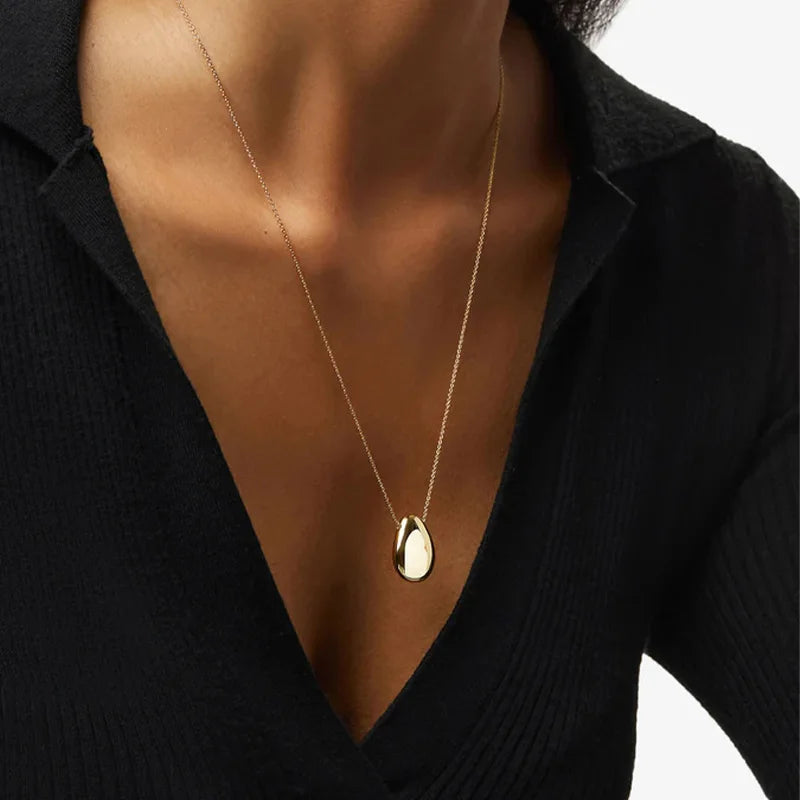 The Sculpted Drop | Sterling Silver & 18k Gold