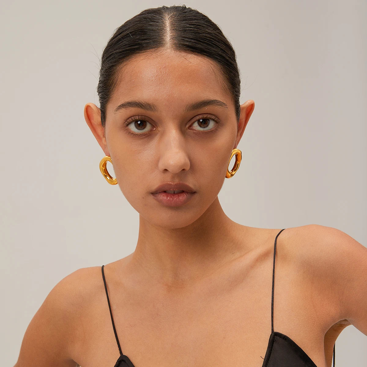 The Sculpted Twist Hoops | 18k Gold PVD Stainless Steel